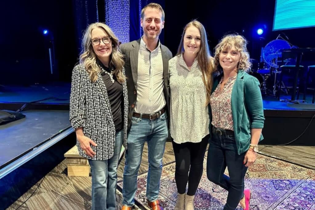 Justine Froelker, a Keynote Mental Health Speaker, with others